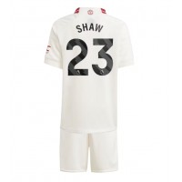 Manchester United Luke Shaw #23 Tredjeställ Barn 2023-24 Korta ärmar (+ Korta byxor)